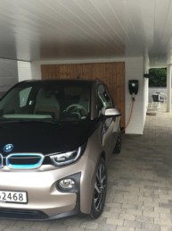 Photo: Electric car charging in carport